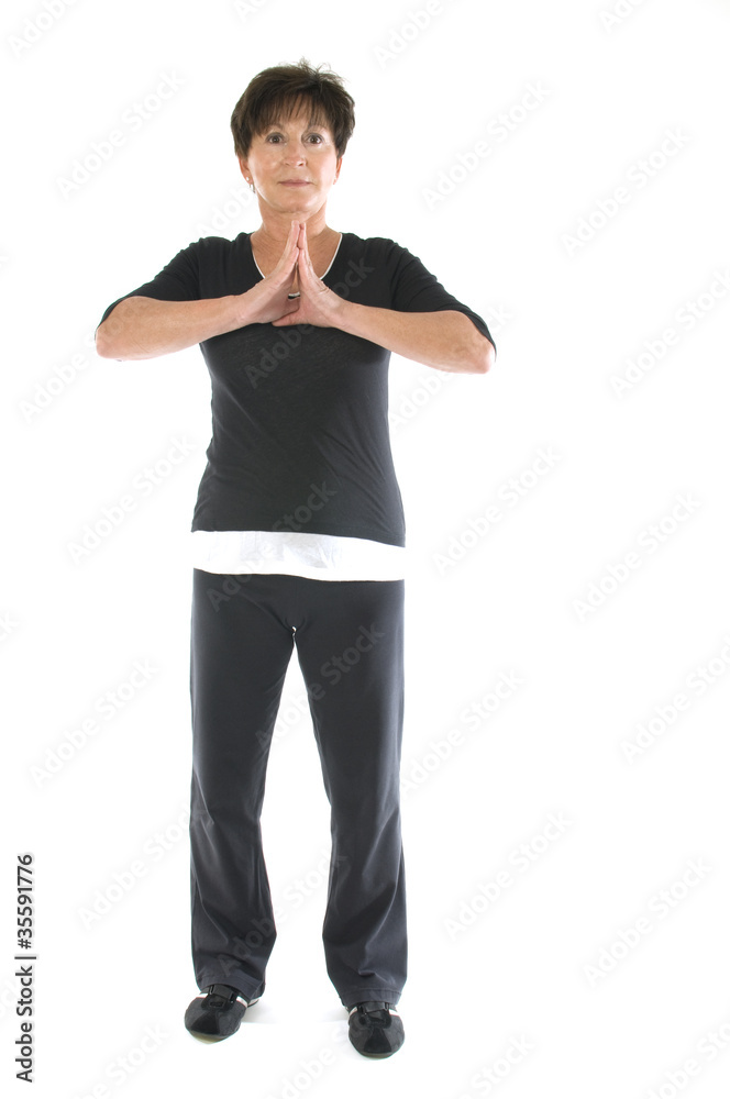 middle age senior woman yoga position stretch middle age senior woman yoga position stretch
