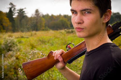 Teenager with gun