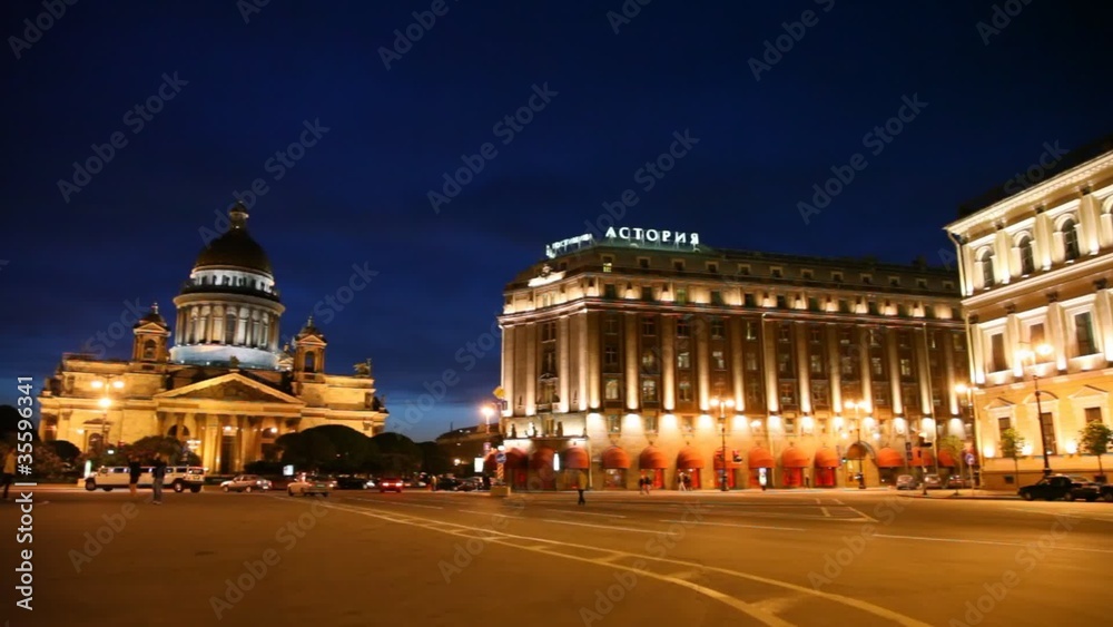 tourists are on Saint Isaac Square and Monument to Nicholas I