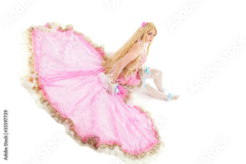 Young girl in fairy-tale doll costume isolated photo