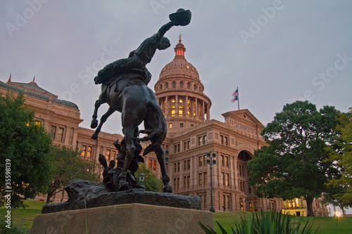 Cowboy Memorial in front of Texas Capitol dome photo