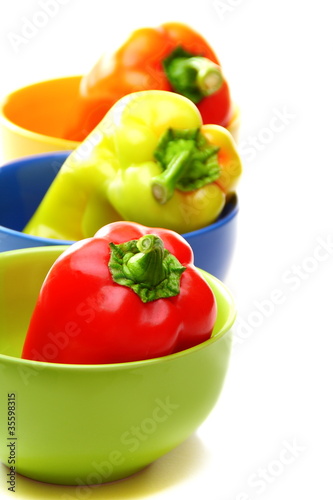 Red, orange and green peppers in color plates.
