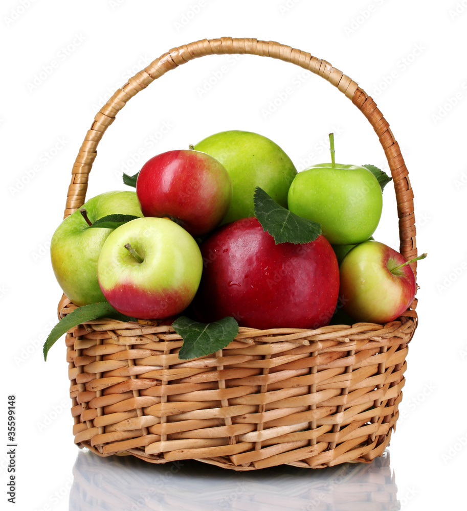 Basket of fresh ripe apples isolated on white