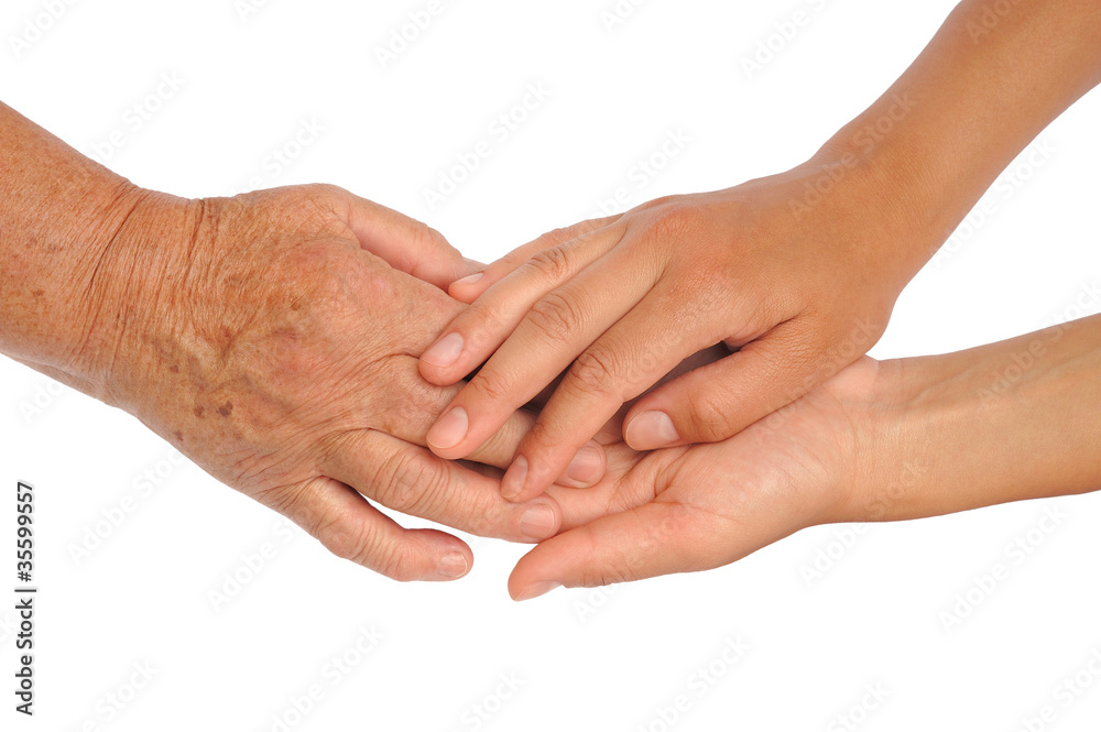 Hands of young and senior women - clipping path included