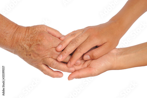 Hands of young and senior women - clipping path included