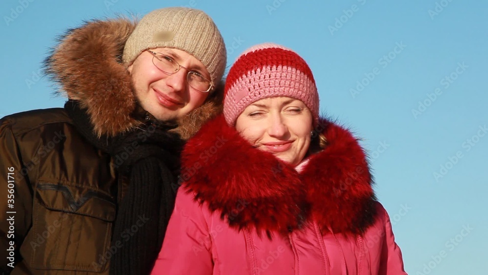 Woman and man at winter outdoors Woman and man at winter outdoors