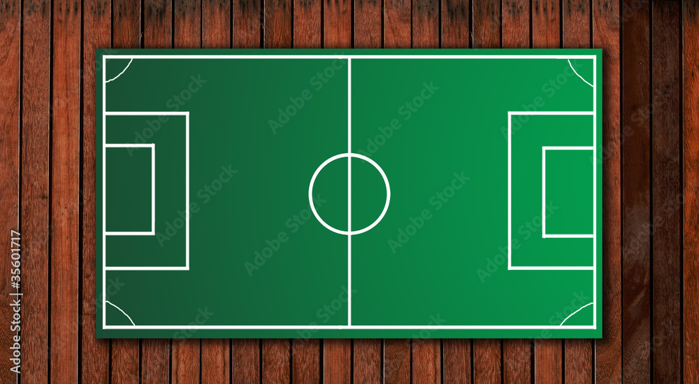 Fototapeta premium football tactical board on wooden floor
