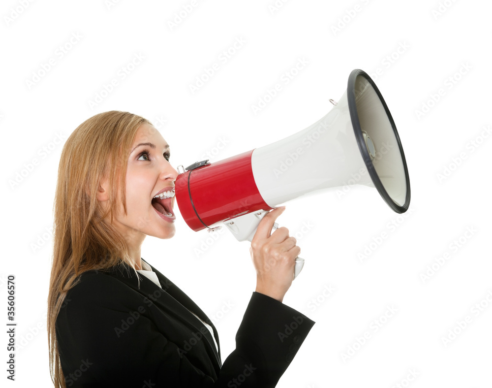 Female executive yelling through a megaphone Female executive yelling through a megaphone