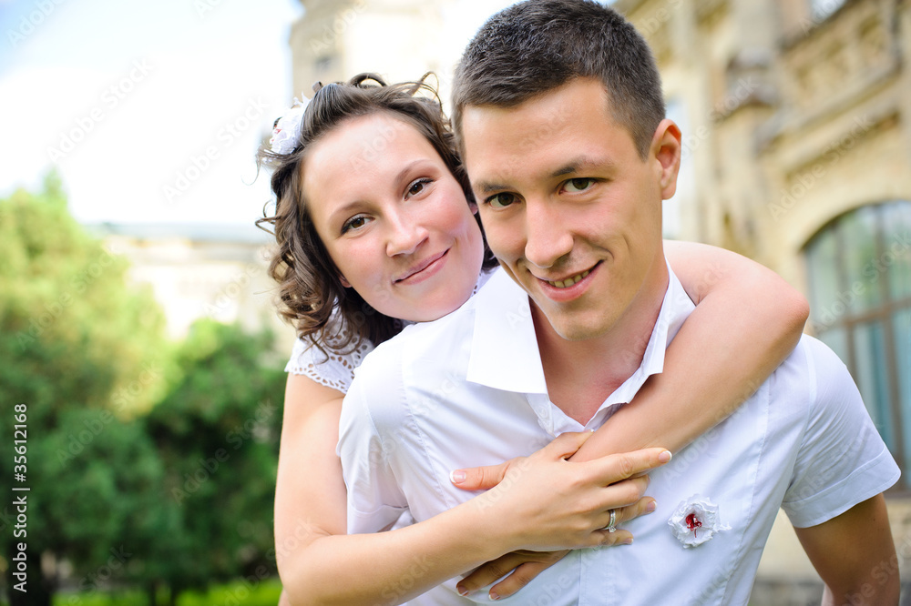 Fototapeta premium Portrait of a happy couple embracing eachother