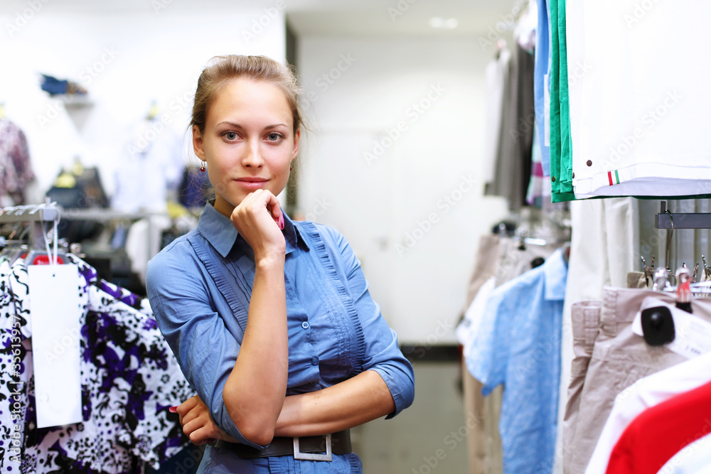 Young girl buying clothes Young girl buying clothes