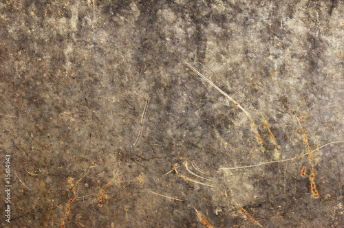 Old, rusty metal close-up, sephia.