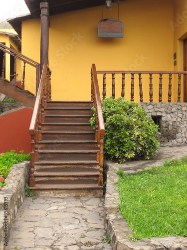 An old town house with front staircase © Aroastock
