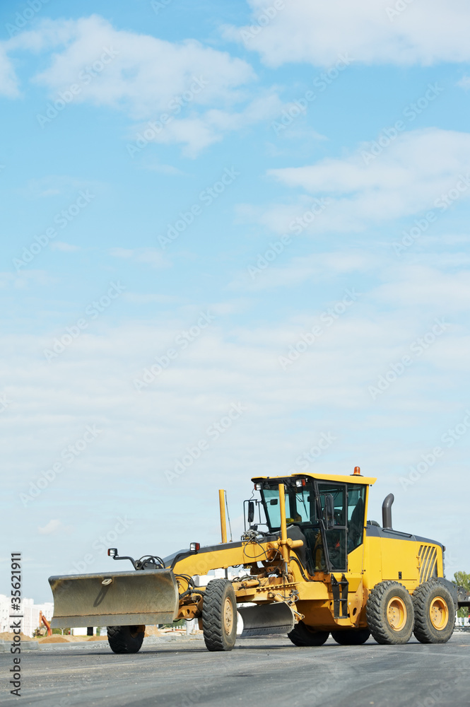 road grader bulldozer