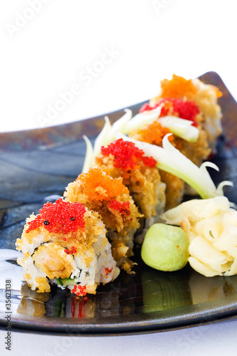 Red and Orange Fish Eggs on Sushi Rolls