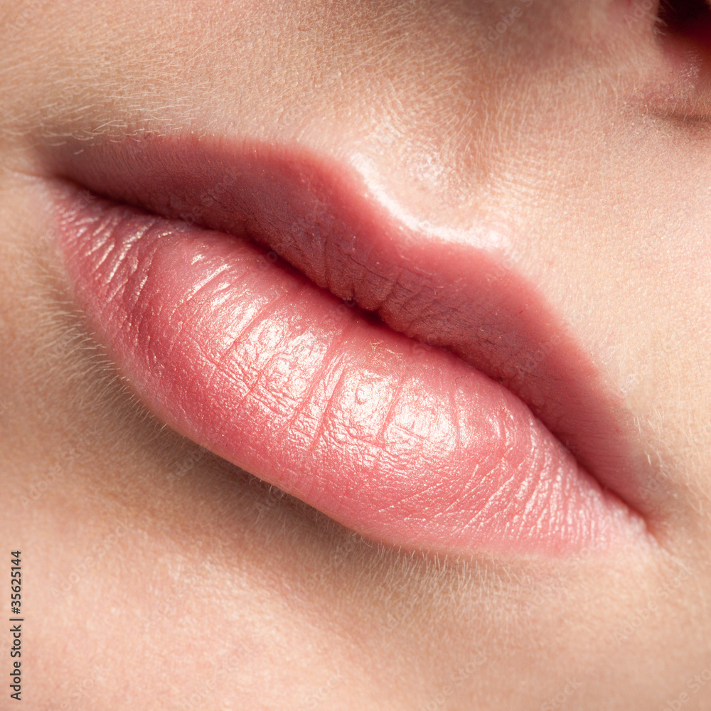 Close-up lips of beauty young woman Close-up lips of beauty young woman