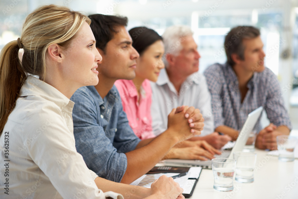 Mixed group in business meeting Mixed group in business meeting