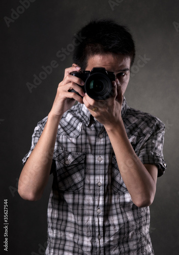 Asian Man with Camera