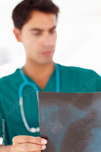 Young male doctor with x-ray