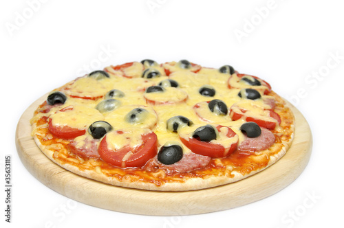 Pizza with tomatoes, sausage and olives