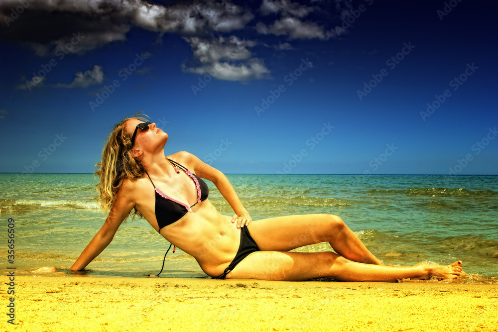 Fototapeta premium Sexy bikini model having fun