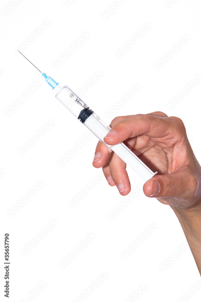 hand with syringe hand with syringe