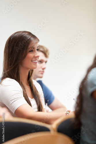 Portrait of a smiling student sitting
