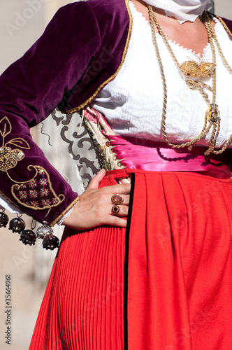 Sardinia, Italy: Redentore festival. Detail of a dress