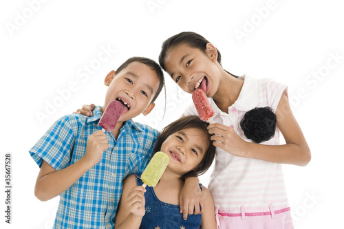 siblings eating ice creams