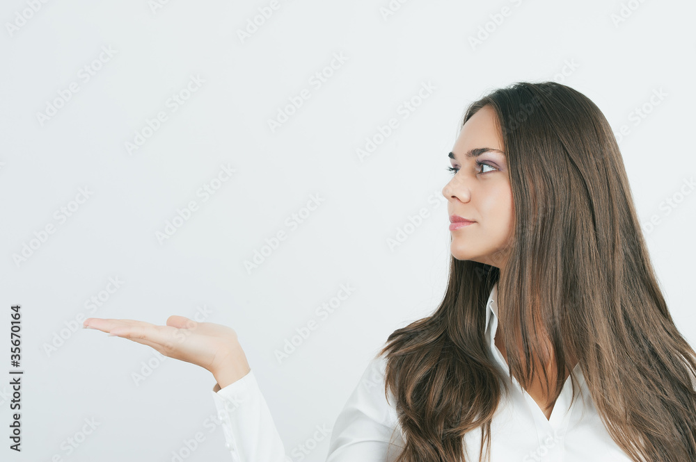 Happy smiling young beautiful business woman showing blank Happy smiling young beautiful business woman showing blank