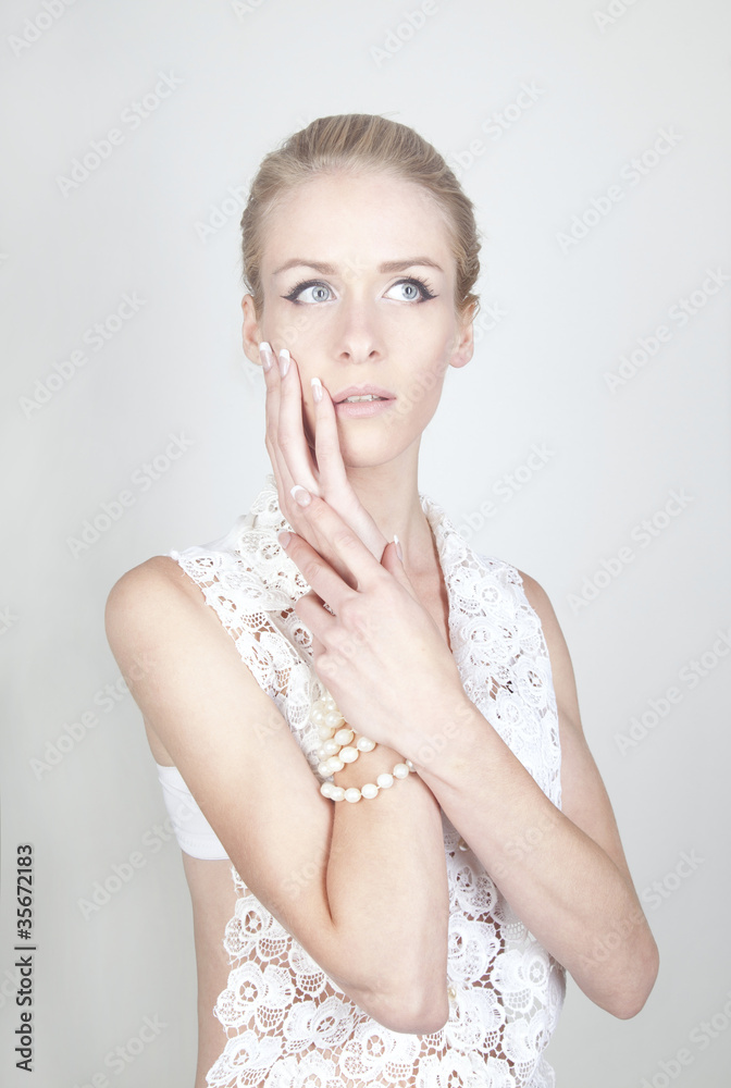 Portrait of young beautiful blond woman with long acrylic nails Portrait of young beautiful blond woman with long acrylic nails