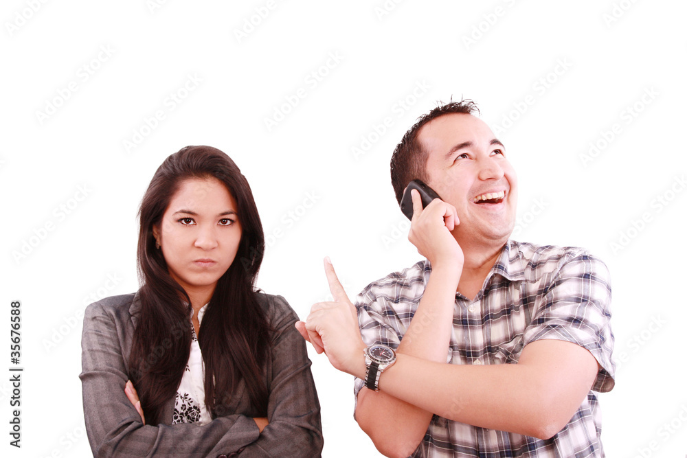 happy man talking on the phone, forgetting about his wife happy man talking on the phone, forgetting about his wife