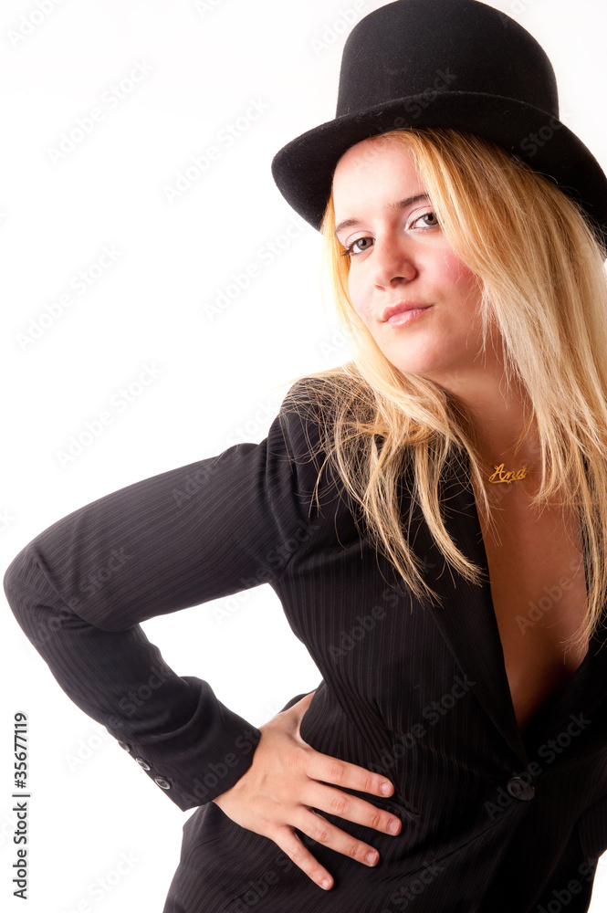 Female model in a executive suit and tall hat Female model in a executive suit and tall hat