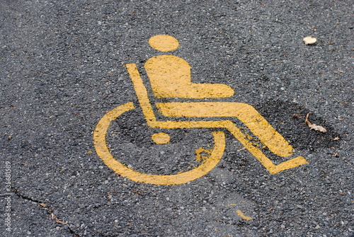 Tela yellow road marking for disabled and invalid parking