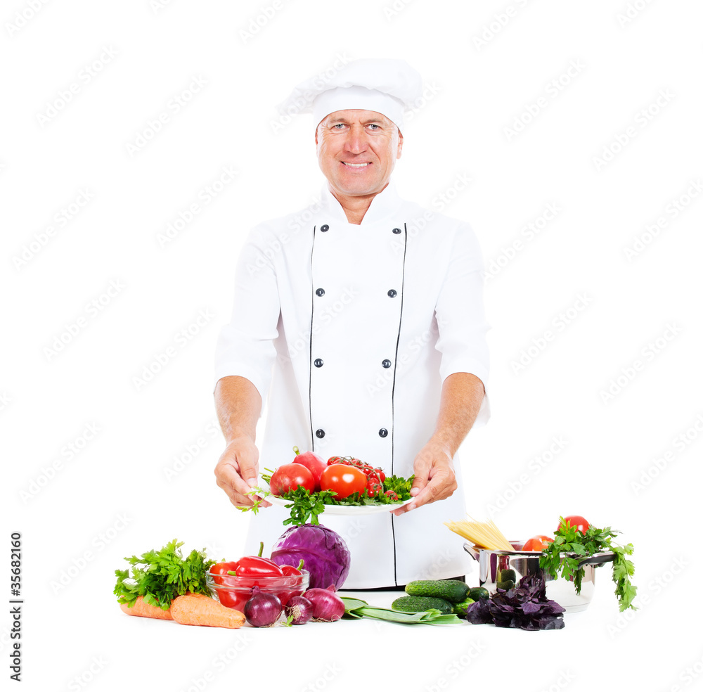 hef holding plate with fresh vegetables hef holding plate with fresh vegetables