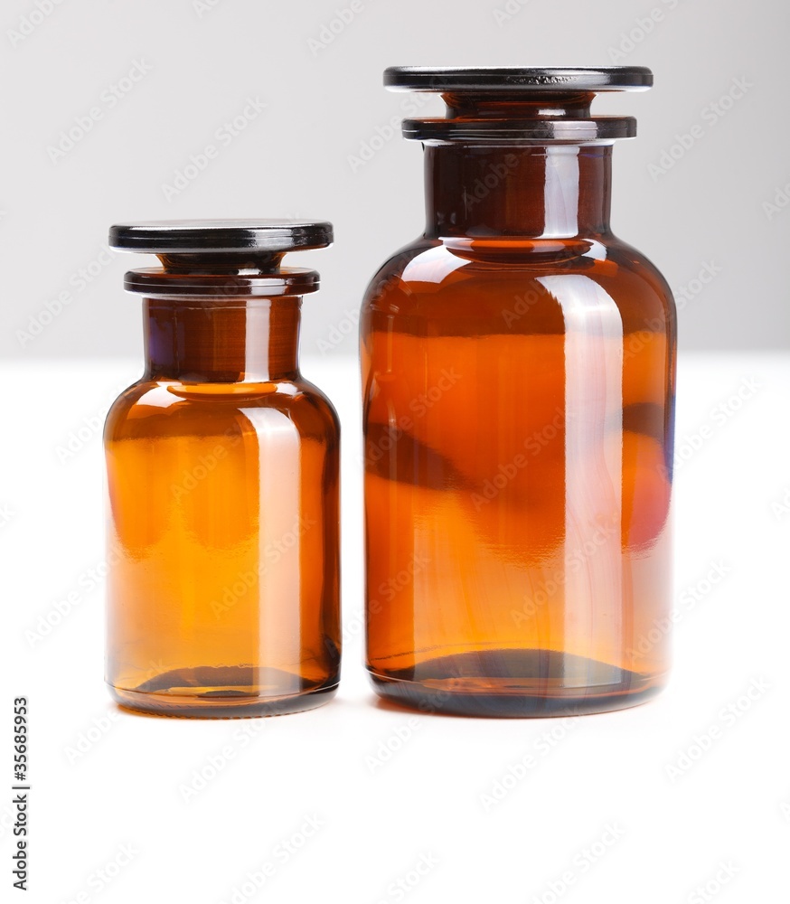 Pair of empty chemical glass bottles