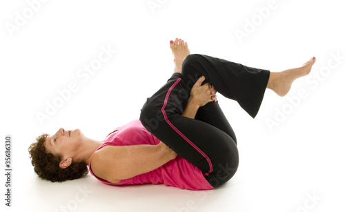 middle age senior woman fitness yoga sit up stretch