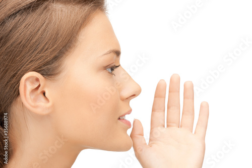woman whispering gossip