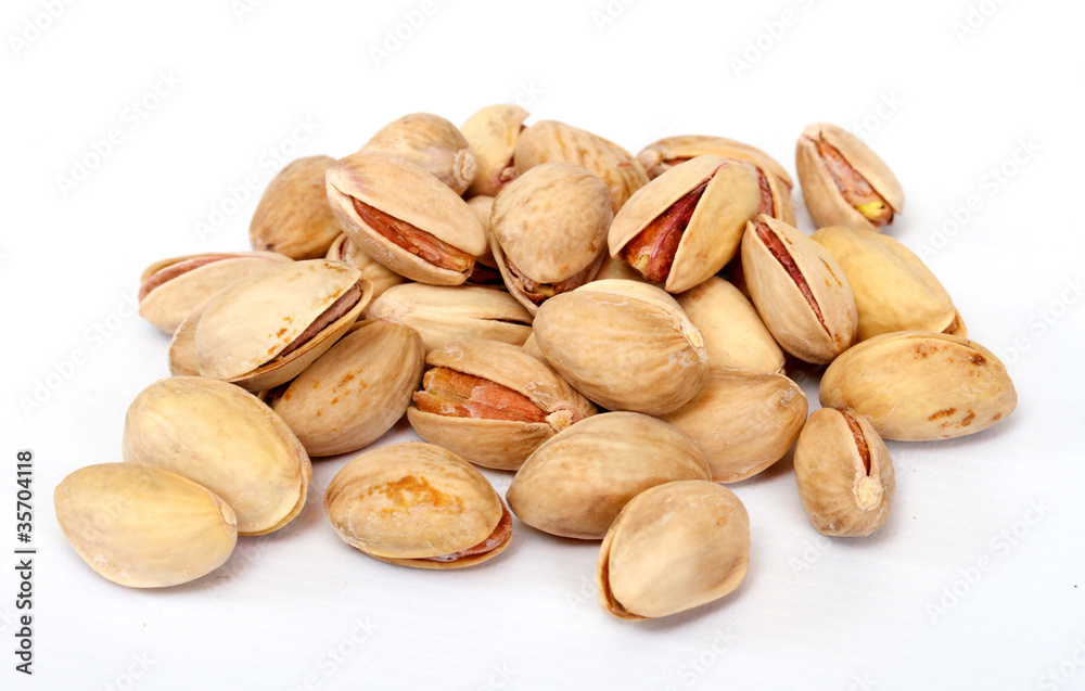 Close-up image of pistachios studio isolated on white background Close-up image of pistachios studio isolated on white background