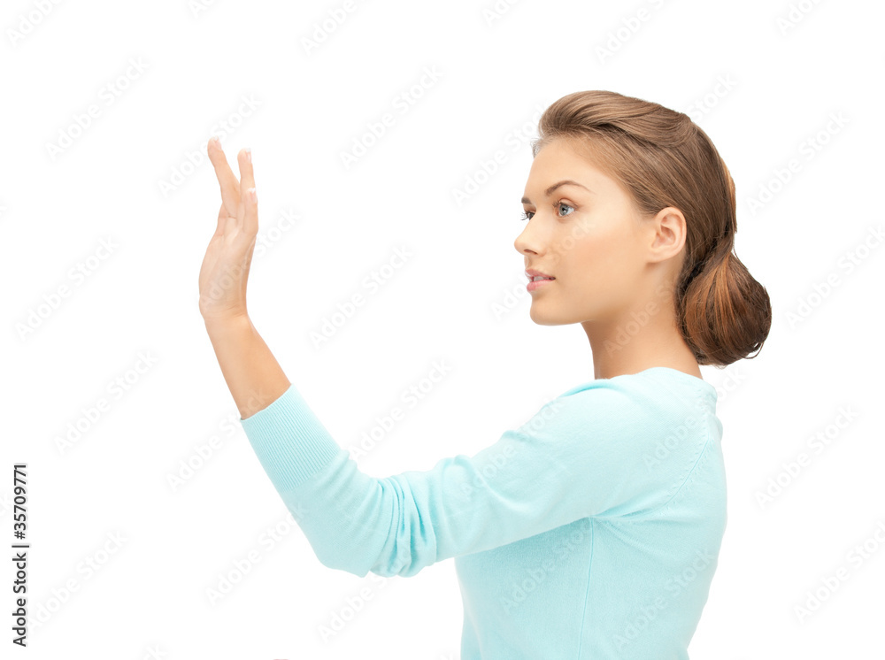 businesswoman working with something imaginary businesswoman working with something imaginary
