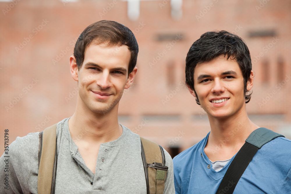 Smiling male students posing Smiling male students posing