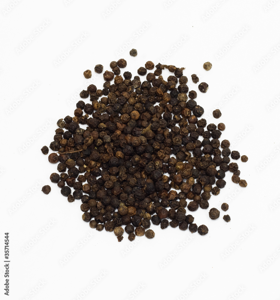 Closeup of black pepper isolated on white background. Closeup of black pepper isolated on white background.