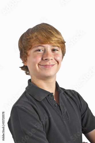 smart little boy smiling on white background