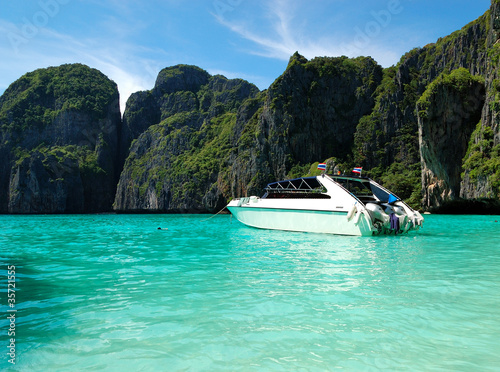 Motor boat on turquoise water of Indian Ocean, Phi Phi island, T