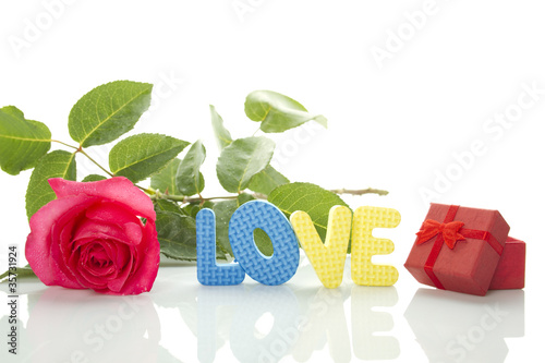 Red Rose, gift box and the text LOVE photo