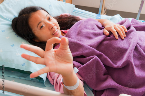 Female patient sowing cheerful