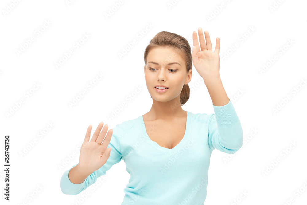 businesswoman working with something imaginary businesswoman working with something imaginary