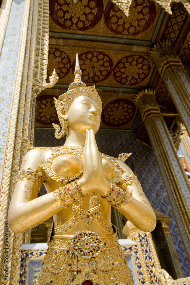 Statue of a legend Kinnaree in Wat Phra Kaeo, Bangkok, Thailand