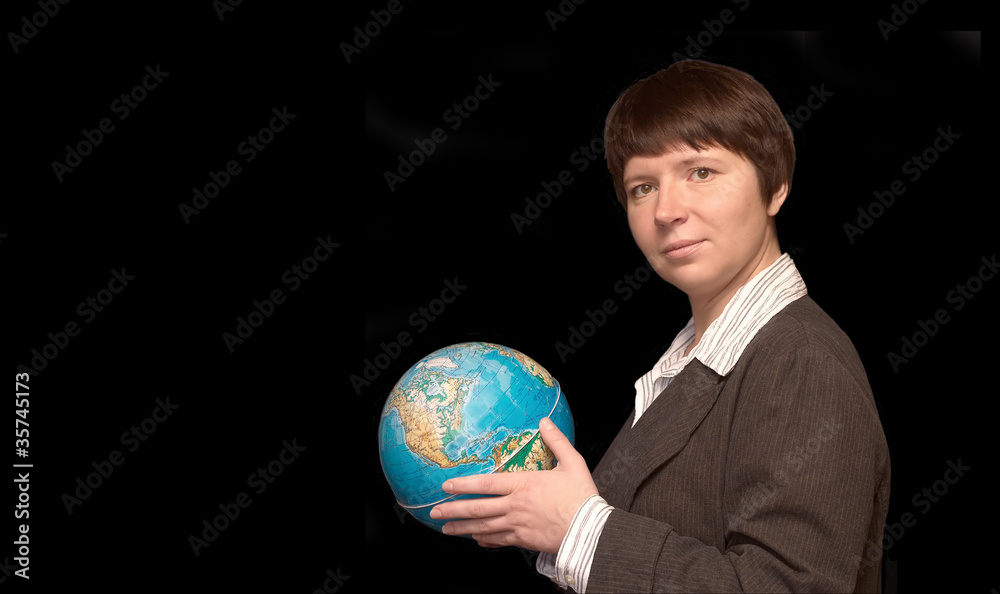 Attractive young business woman in jacket and blouse with globe Attractive young business woman in jacket and blouse with globe