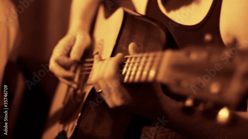 Man playing Acoustic Guitar