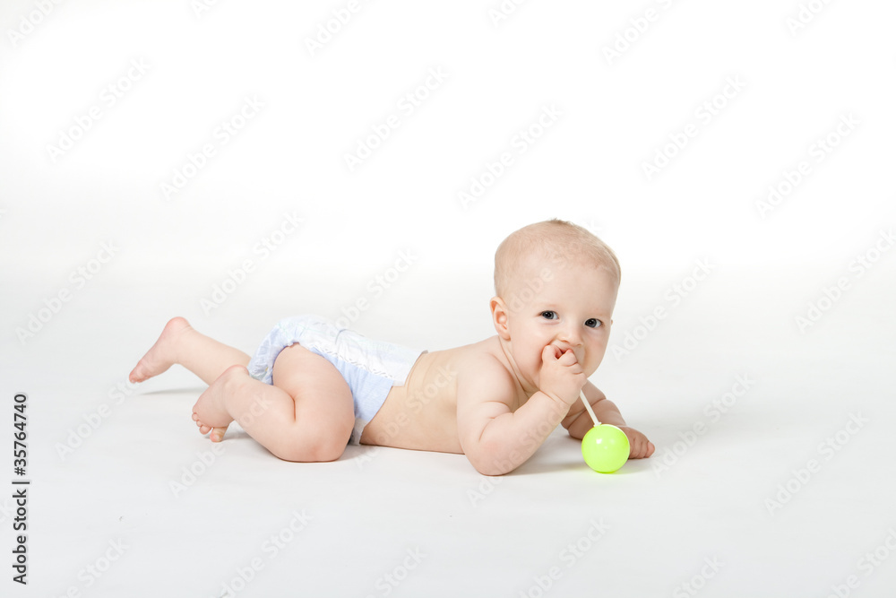 Baby of six month with toy on white background Baby of six month with toy on white background